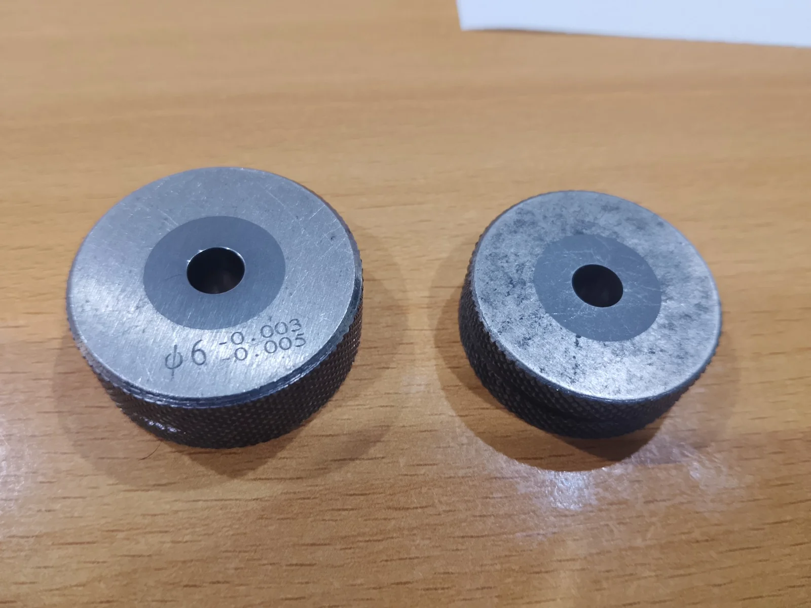 Plain ring gauge samples with engraved diameter and tolerance markings